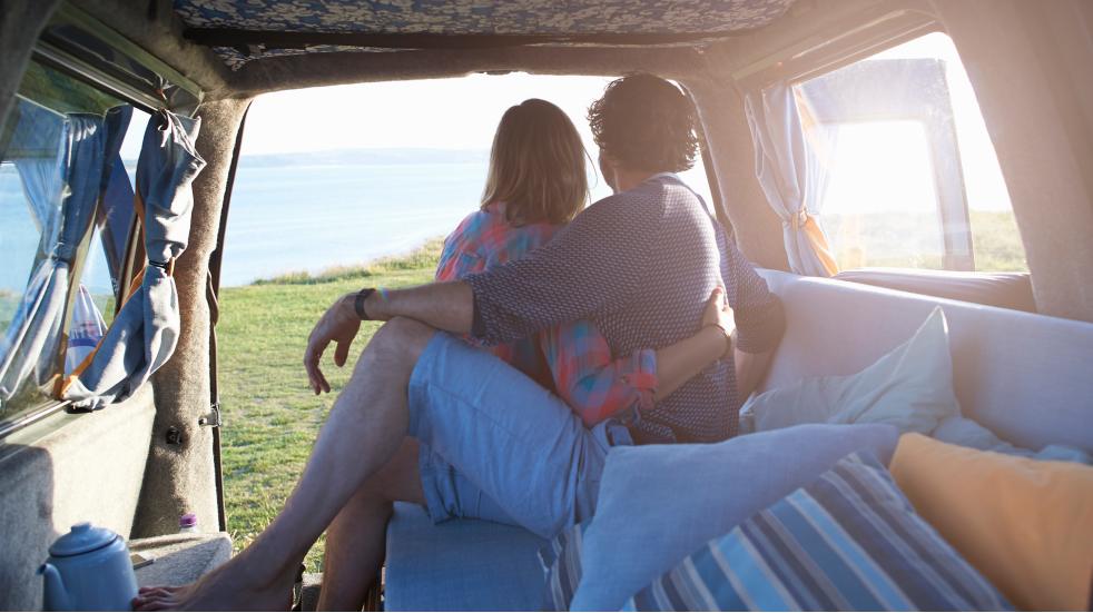 Couple sat in motorhome